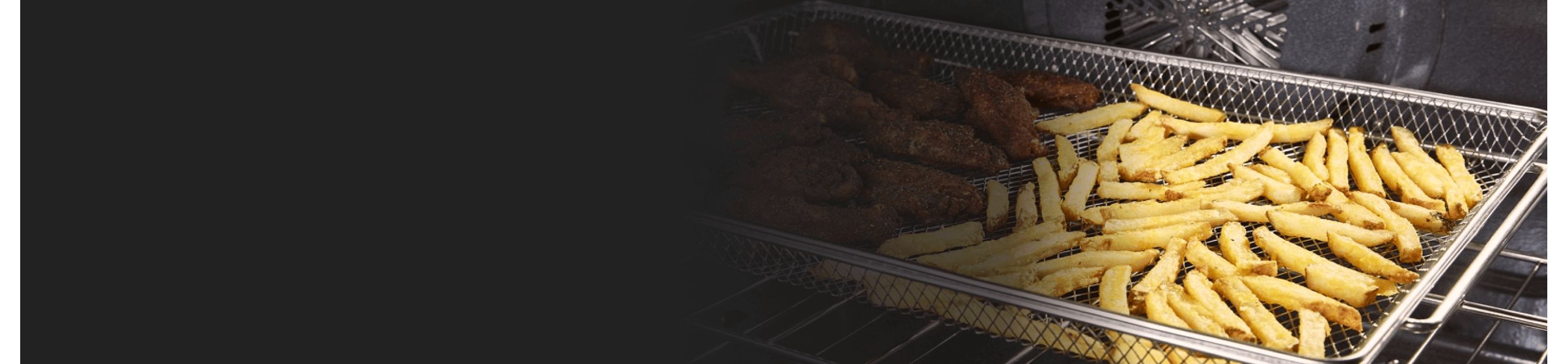 French fries in an air fryer basket