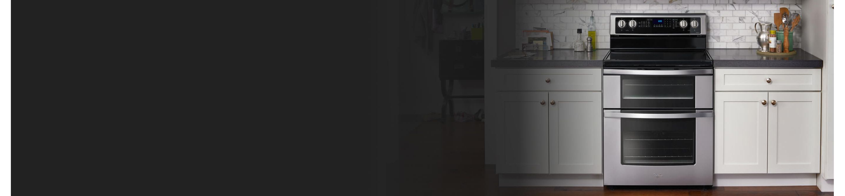 Whirlpool® range set in white cabinetry 