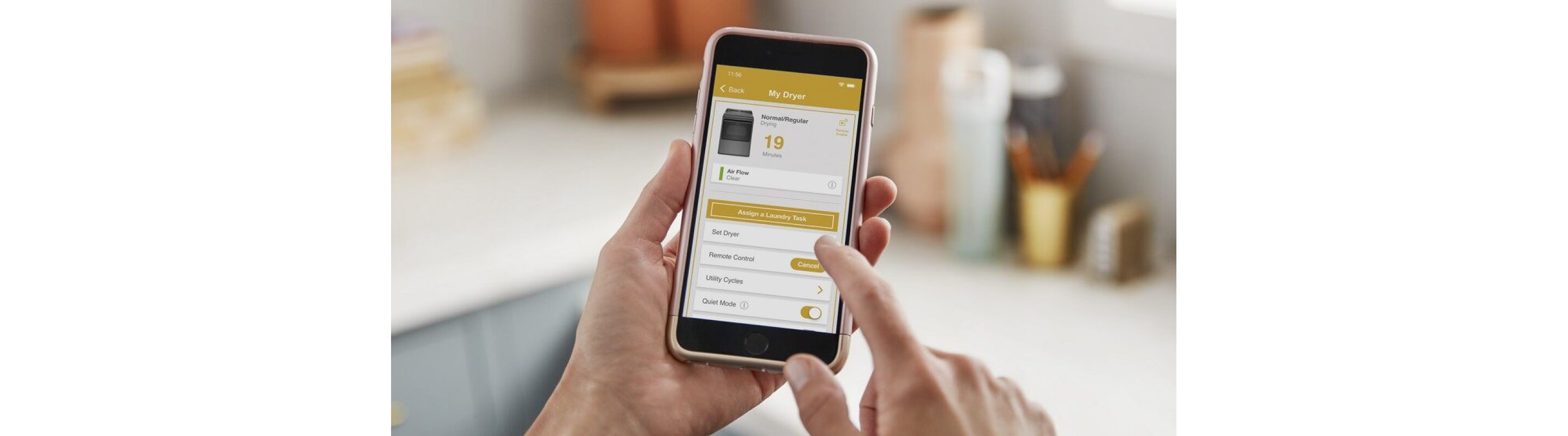 Person using the Whirlpool® App on a smartphone