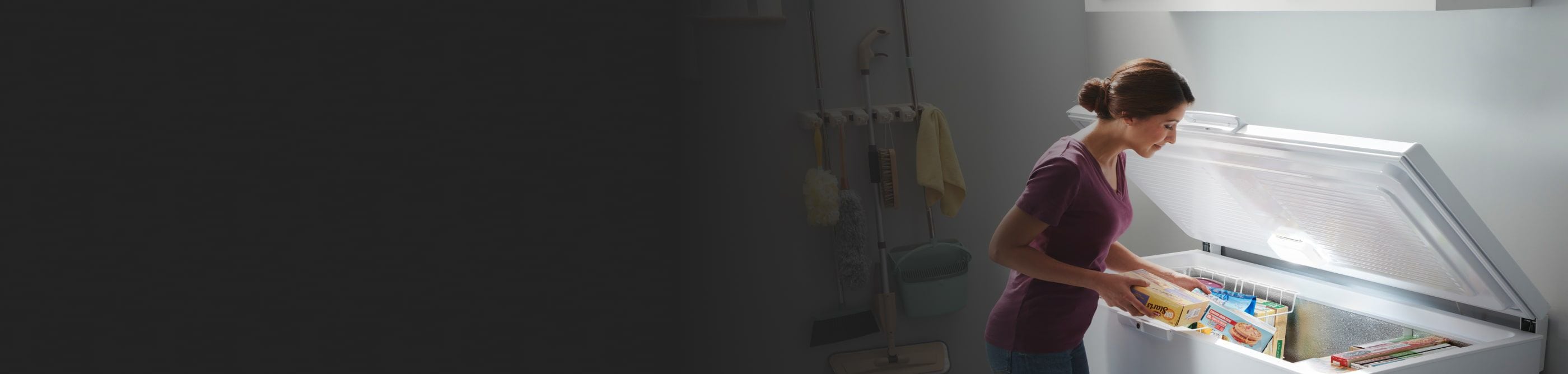 Person Using Chest Freezer Can You Lay a Freezer on its Side? | Whirlpool
