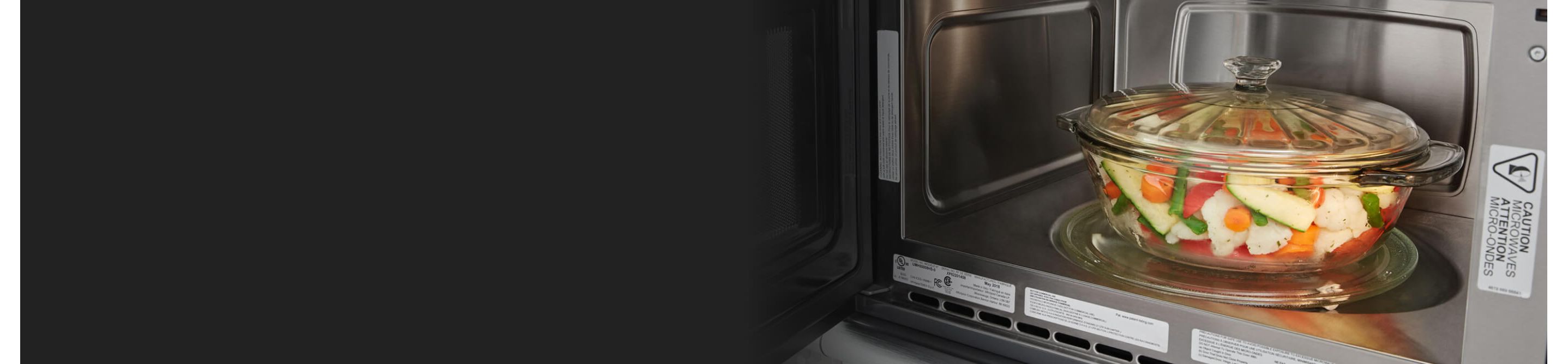 Glass bowl filled with vegetables in Whirlpool® microwave