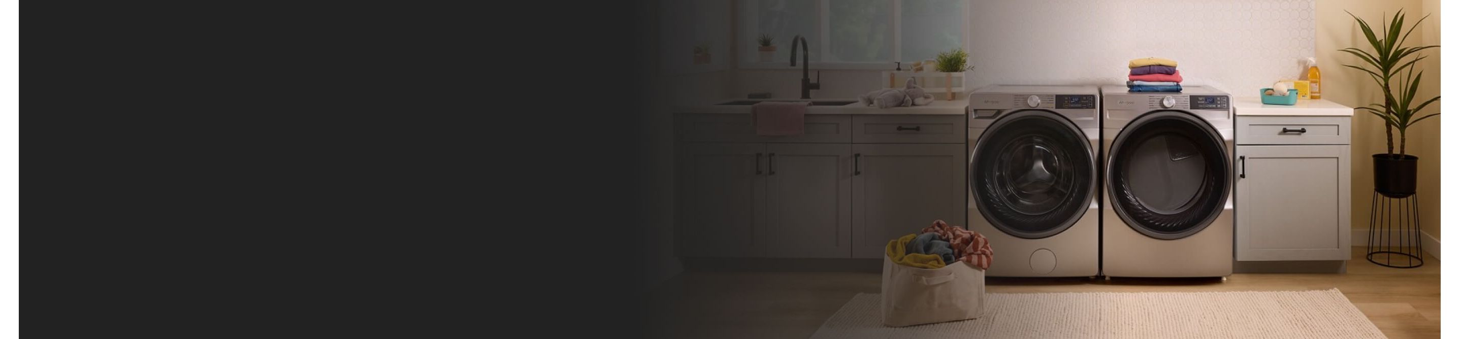 A Whirlpool® Washer and Dryer set in a modern laundry room