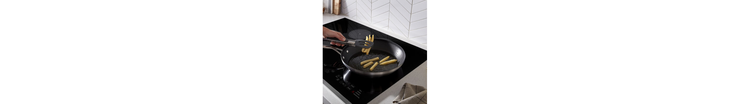A non-stick pan on a Whirlpool® Cooktop