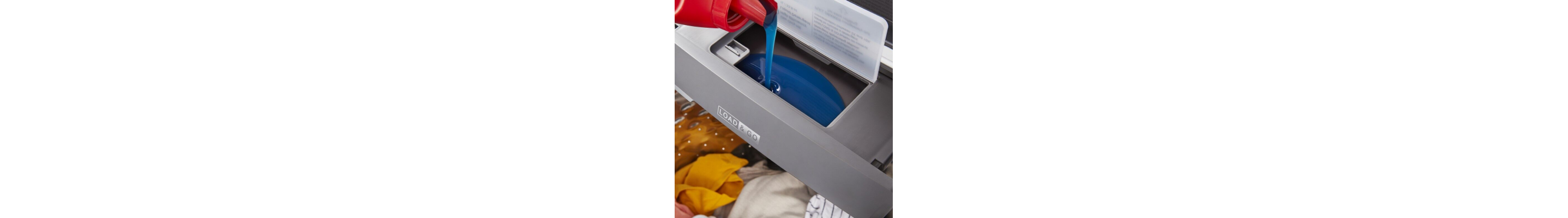 Detergent pouring into dispenser