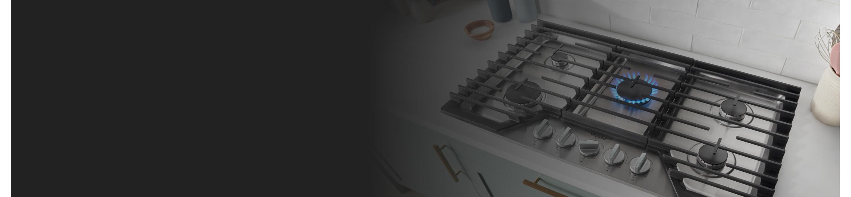 Top view image of cooktop set into white countertop