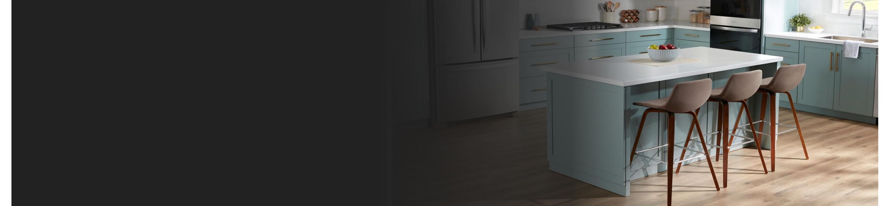 Three stools nestled into a kitchen island