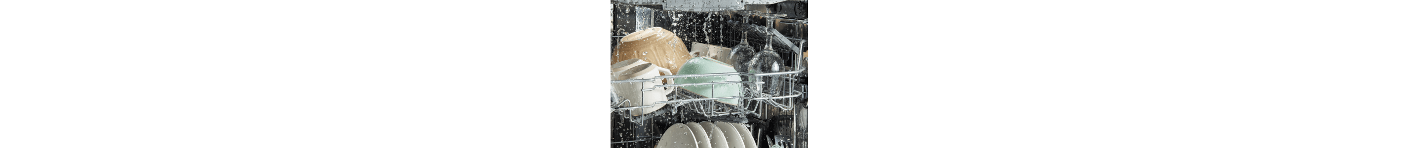 Water spraying on dishes inside a dishwasher