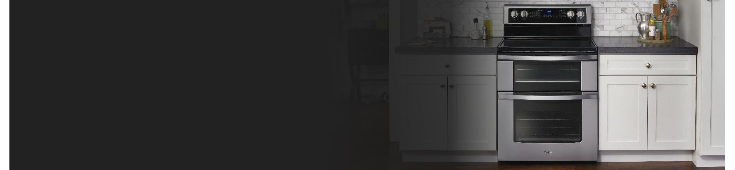 Whirlpool brand double oven range in modern kitchen