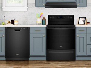 Black Whirlpool® appliance suite in pale blue cabinetry