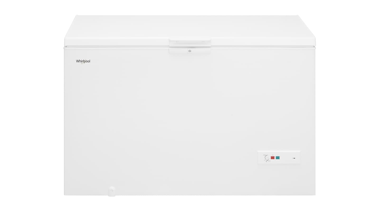 A white chest freezer against a white background