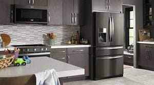 Interior of a family’s kitchen with a 4-door refrigerator
