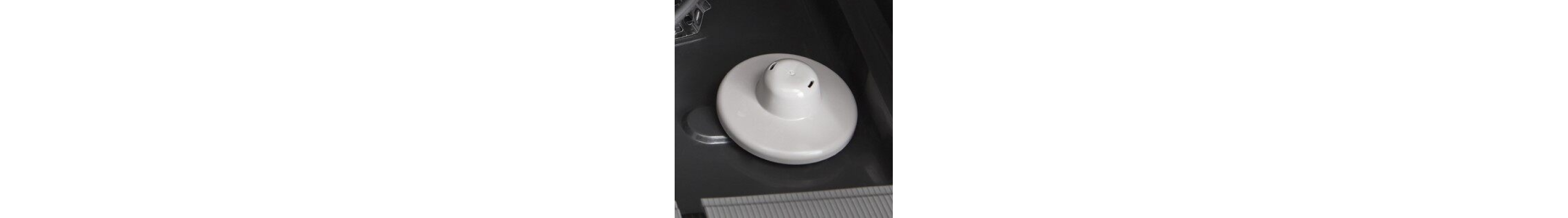 An overfill protection float at the base of a Whirlpool® dishwasher.
