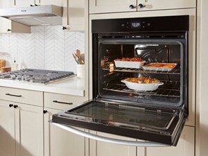 Food cooking on both racks of a single wall oven