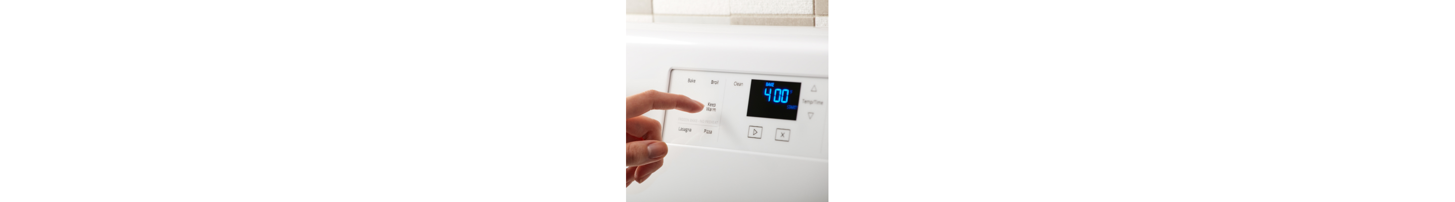 A finger pressing an analog control