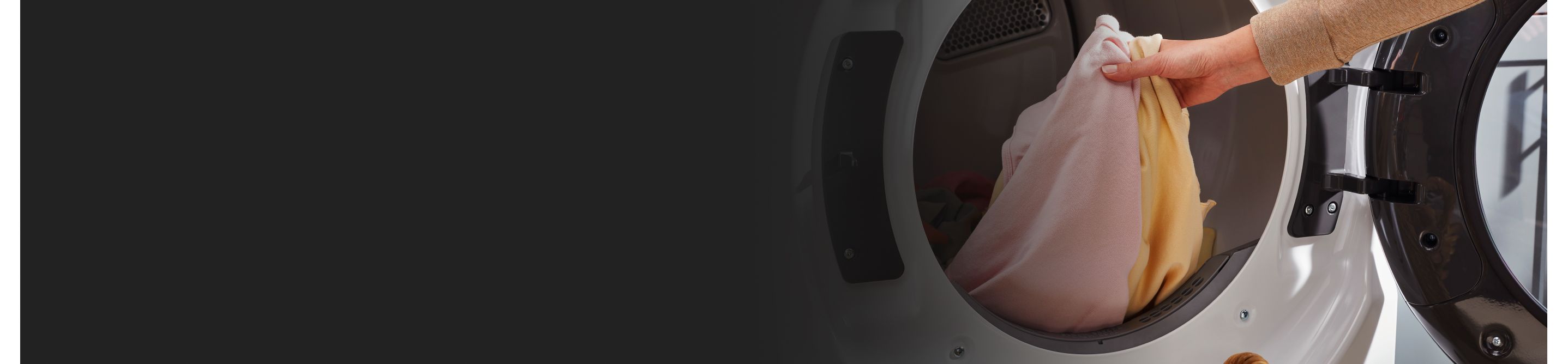 Person taking laundry out of dryer