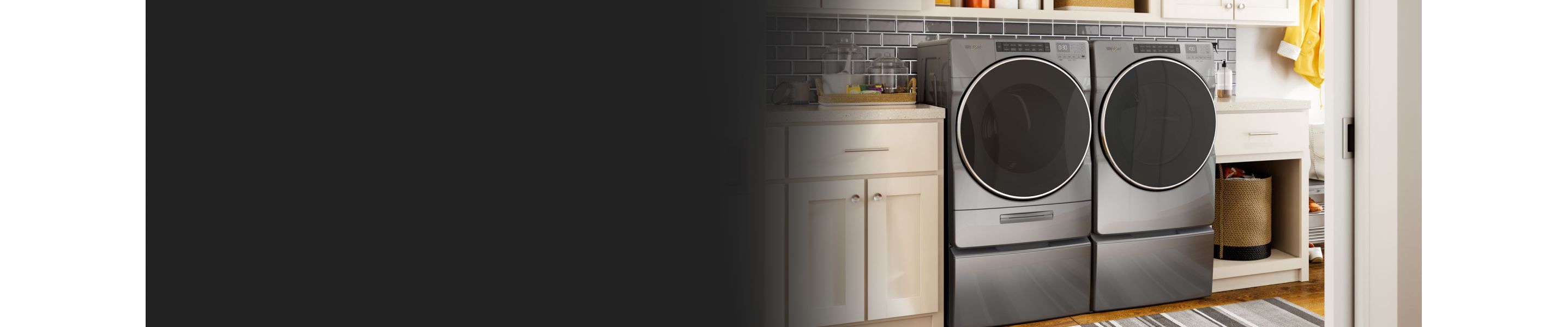 A Whirlpool® Washer and Dryer in a laundry room