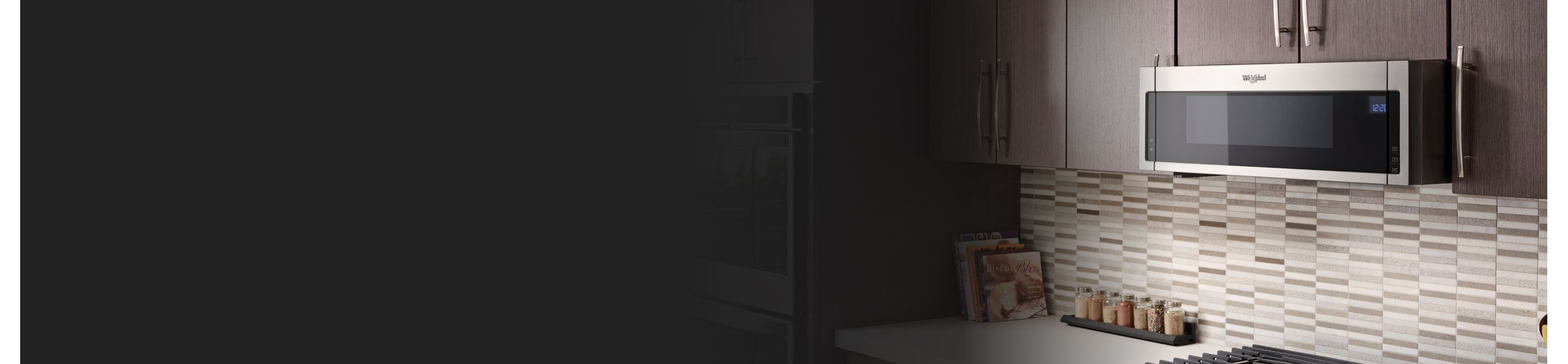 Whirlpool® Low Profile Microwave in brown cabinetry