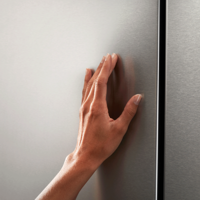 Hand wiping a stainless steel surface