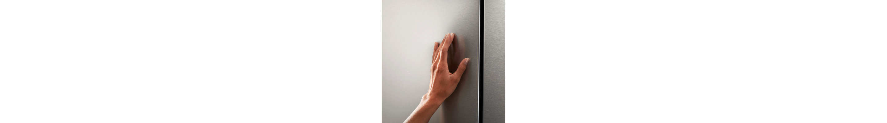 Hand wiping a stainless steel surface