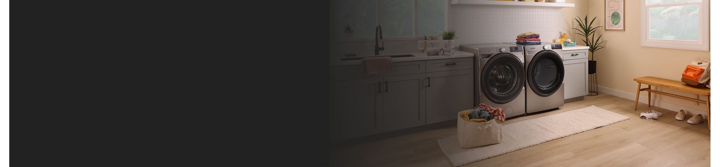 Whirlpool® Washer and Dryer in a large laundry room