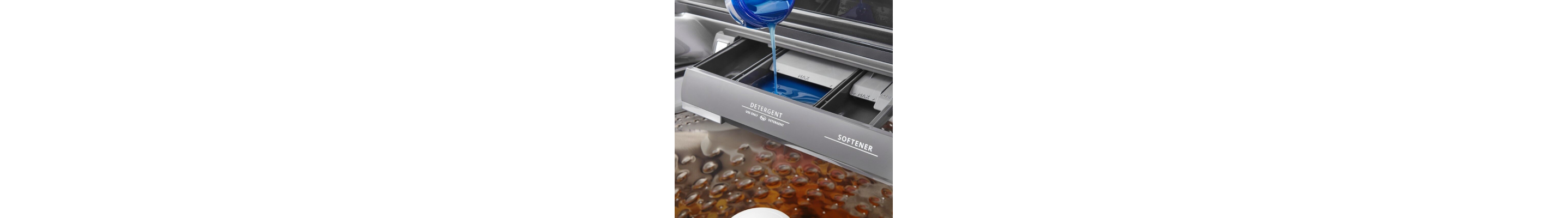 Laundry detergent poured into the washer's dispenser compartment