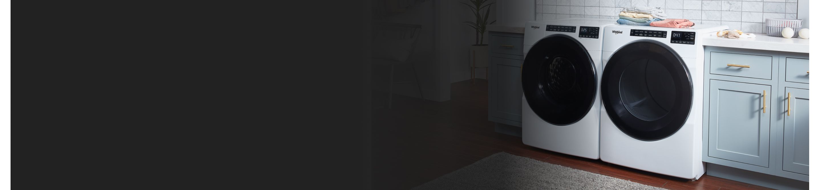White front-load washer and dryer in a laundry room