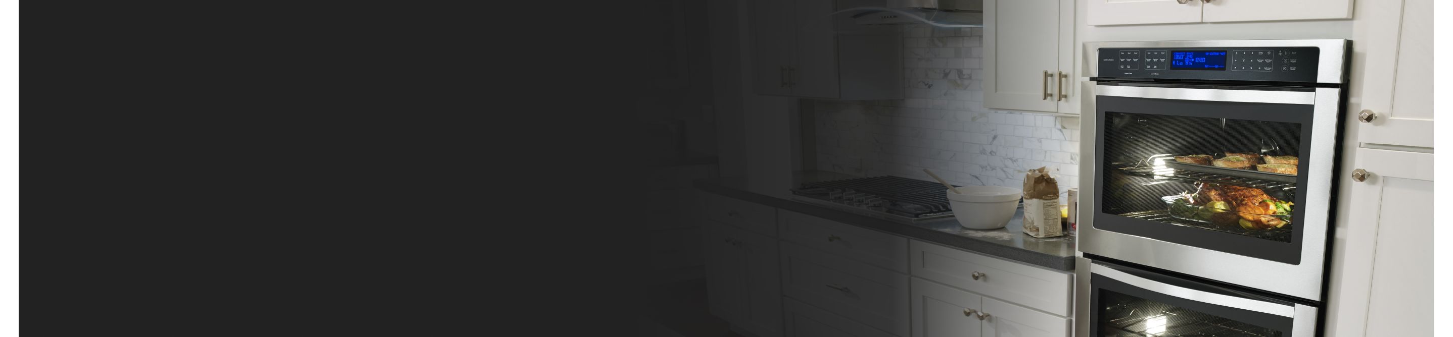 Whirlpool® double wall oven in a white modern kitchen