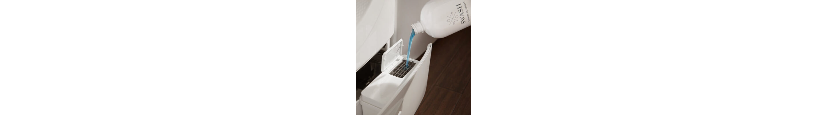 Swash® Laundry Detergent being added to washer
