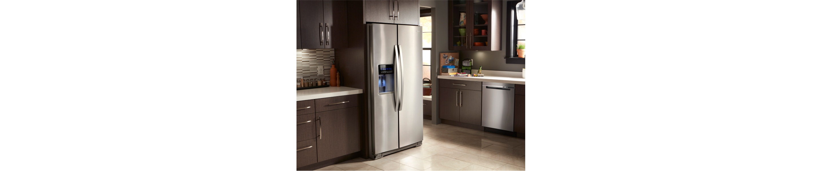A counter-depth side-by-side refrigerator in a kitchen