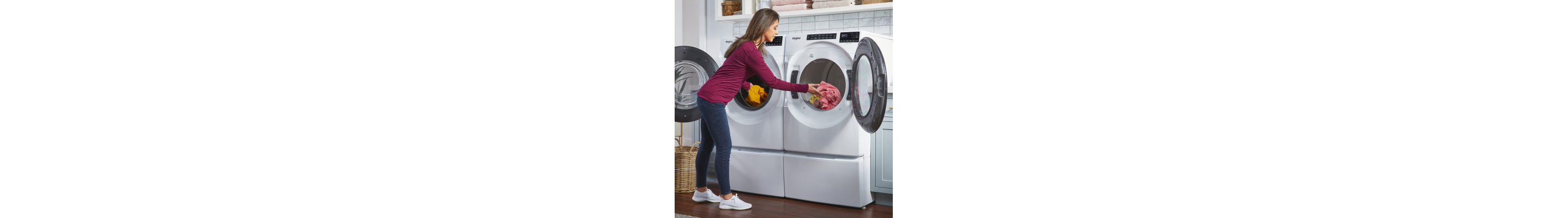 Person loading washer and dryer