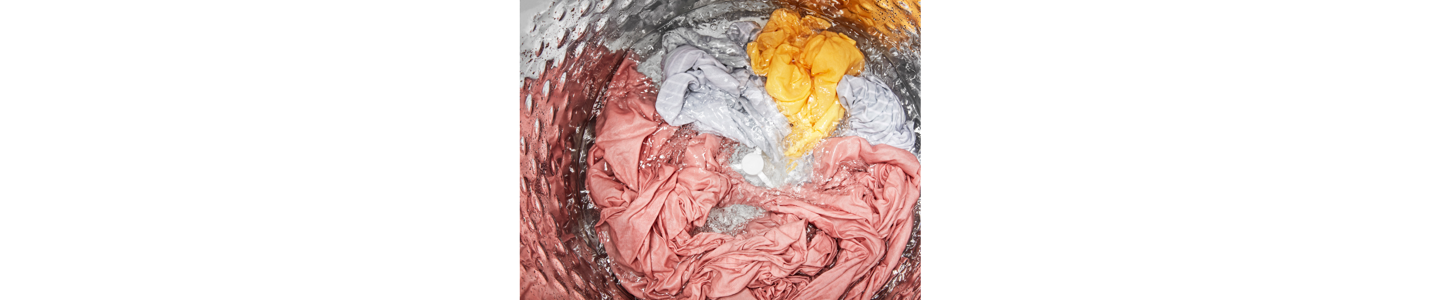 An aerial view of a load of laundry mid wash cycle