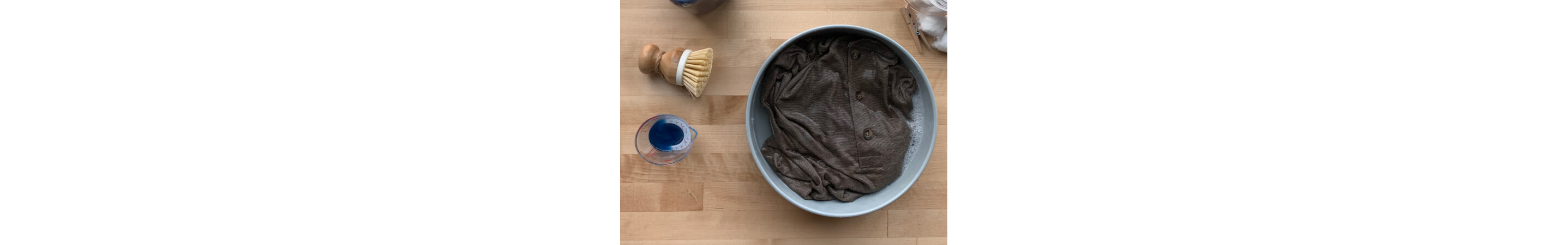Shirt soaking in a basin