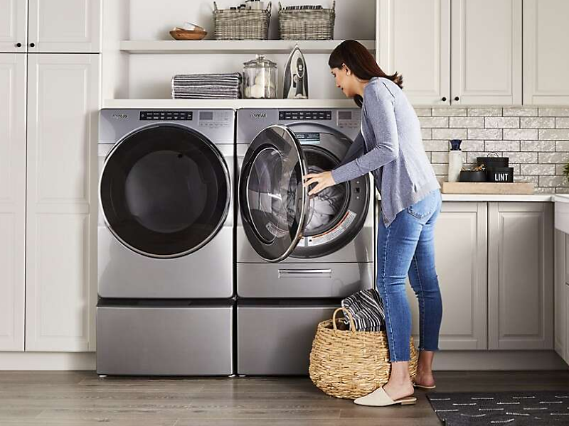 Washing down top coat in machine