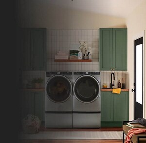 A laundry room with a front load washer and dryer pair