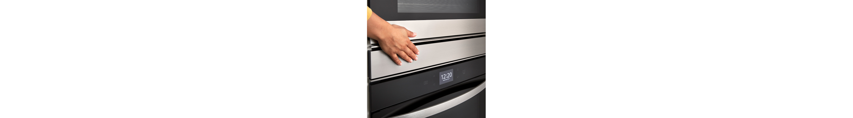 Person closing an oven