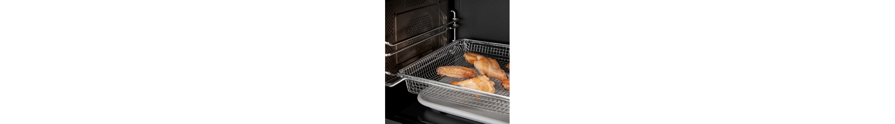 Air fry basket cooking chicken wings in microwave
