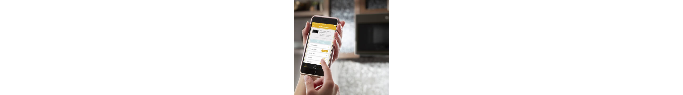 Person selecting settings on Whirlpool® App