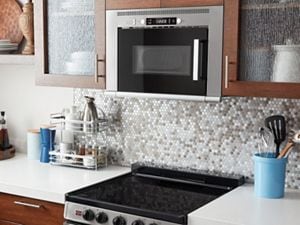 Microwave over gas range store with exhaust fan