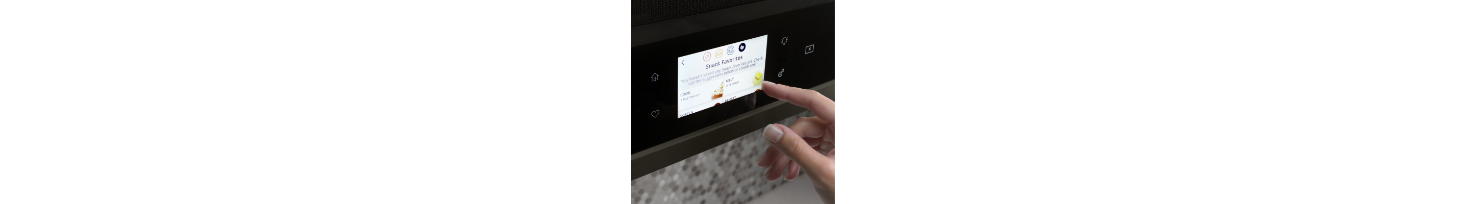 Person selecting settings on a Whirlpool® Smart Over-the-Range Microwave