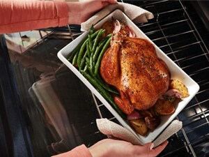 Chicken and veggies in a serving bowl
