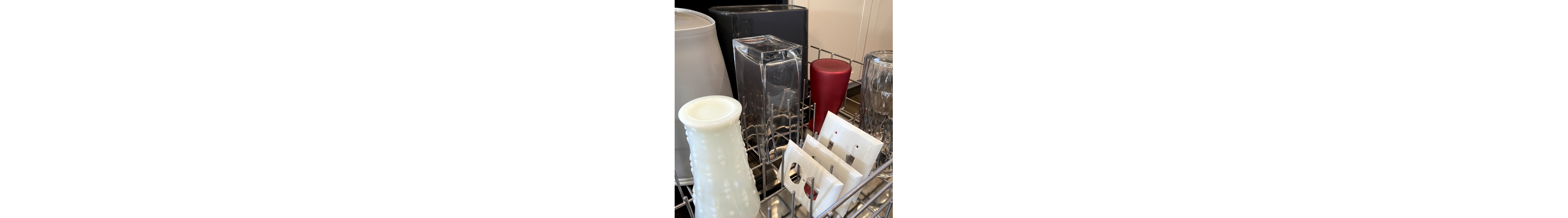 Home decor on the top rack of a dishwasher