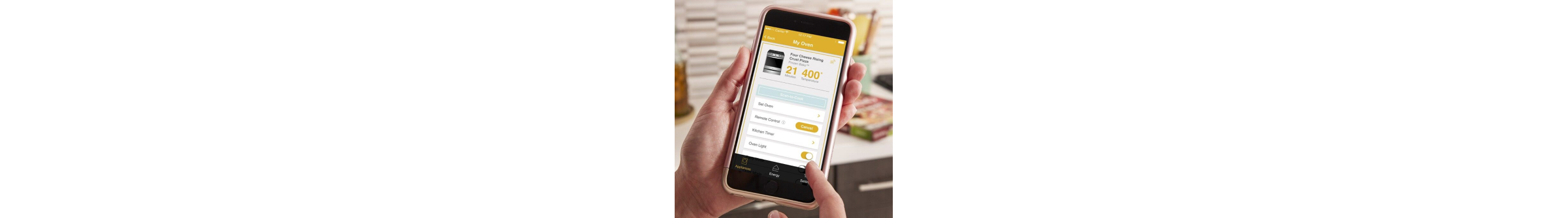 Person preheating oven remotely on the app