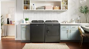 Whirlpool® Washer and Dryer side by side in a laundry room