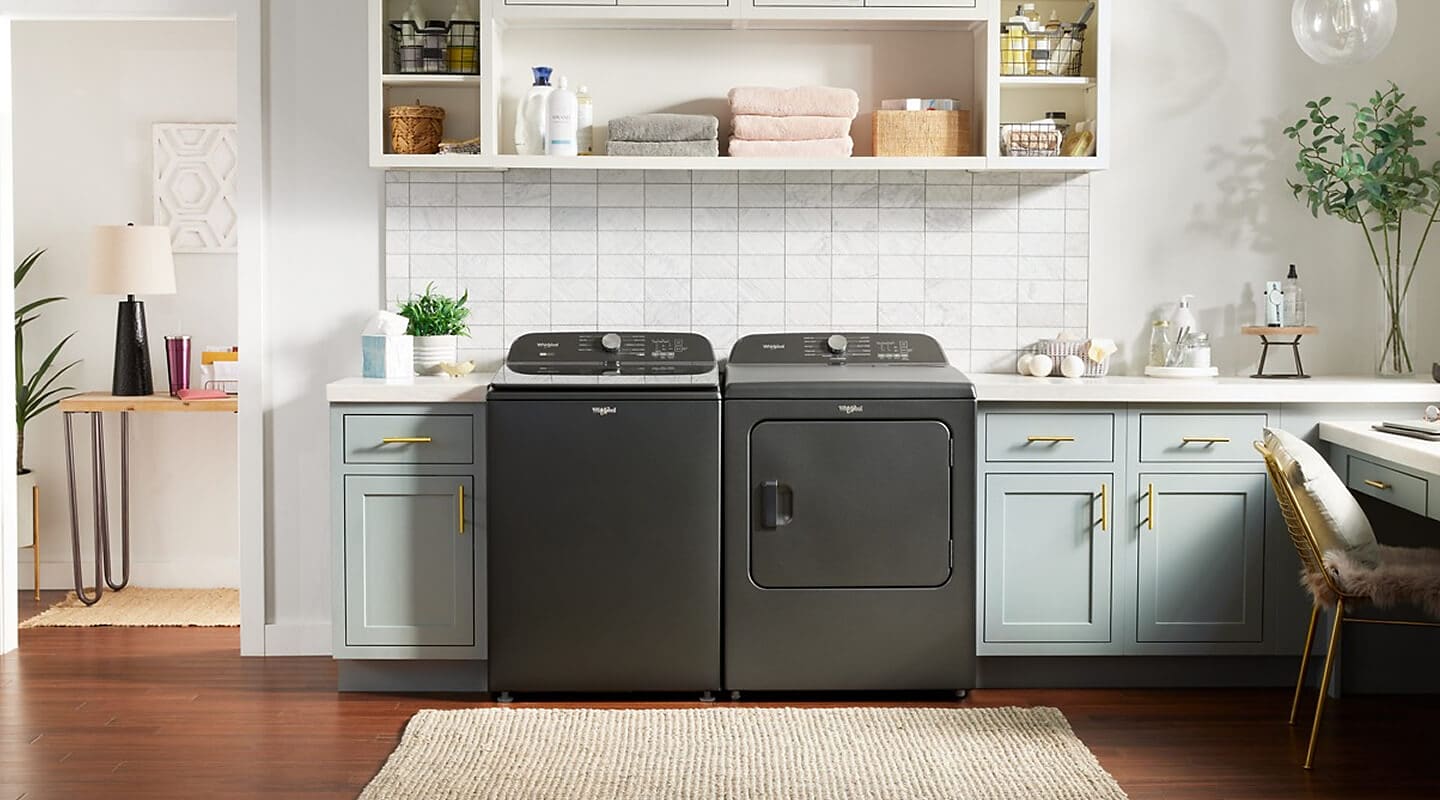 Whirlpool® Washer and Dryer side by side in a laundry room