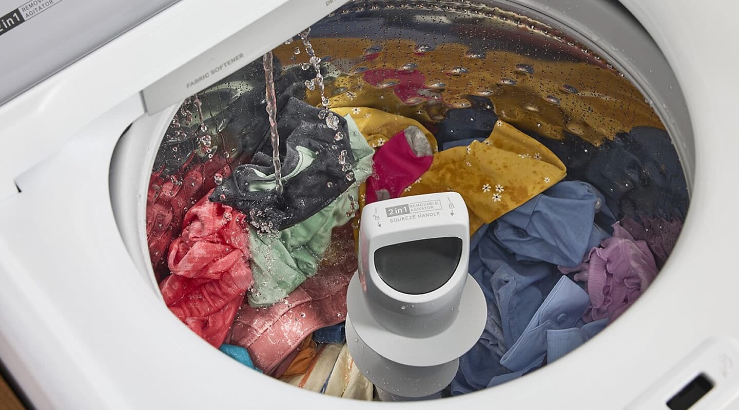 Water running into a Whirlpool® Washing Machine with a 2-in-1 Removable Agitator