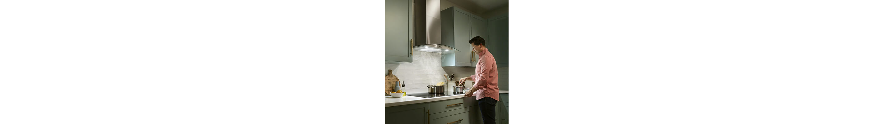 Person stirring a pot of food on an electric cooktop