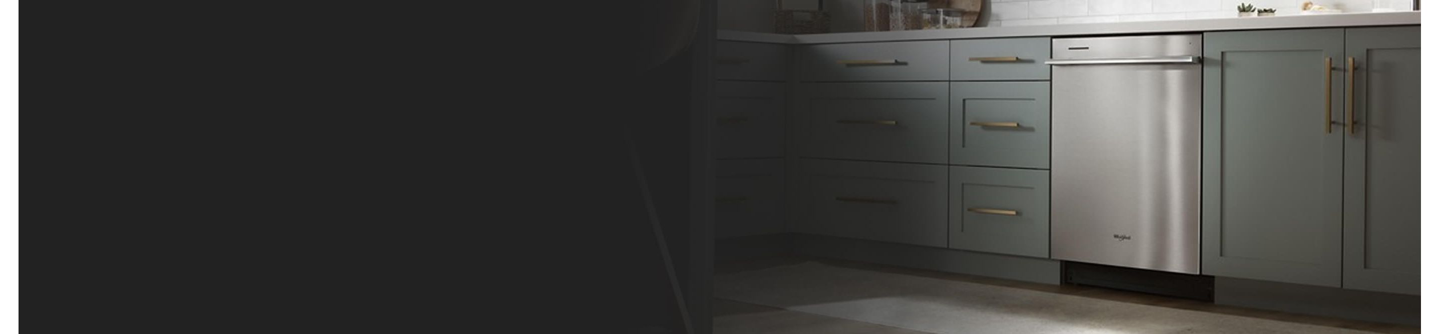 Whirlpool® Dishwasher set in light green cabinetry