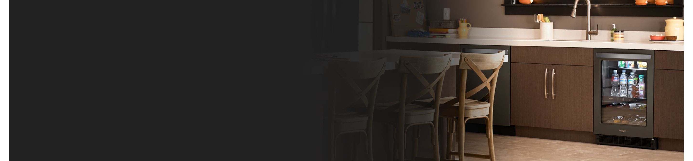 Black beverage cooler underneath countertops