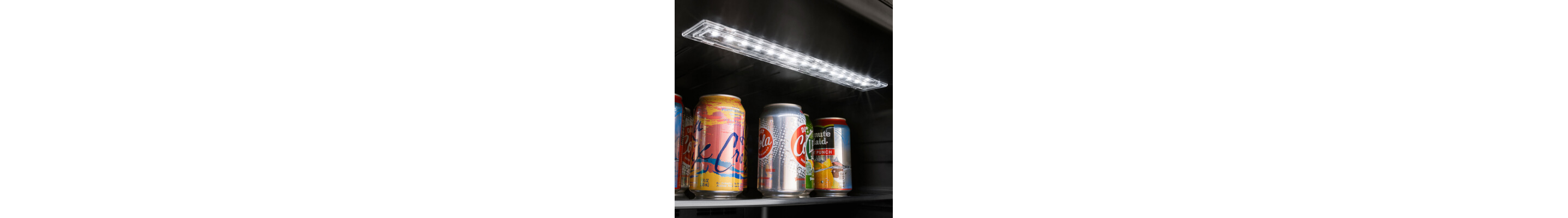 Interior light from beverage center shining on soda cans