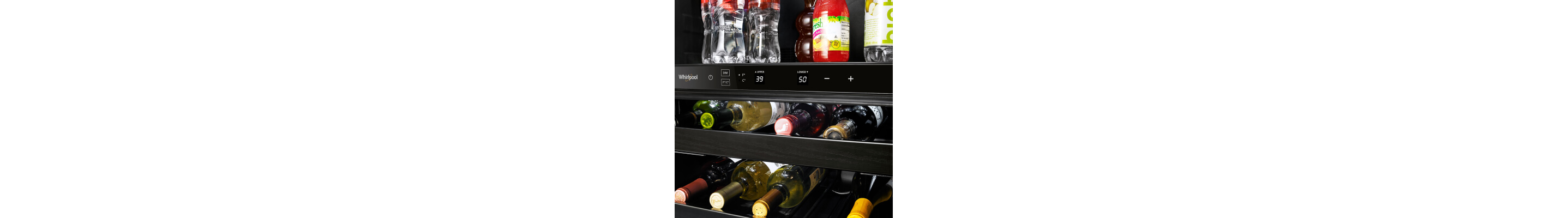 Wine bottles and miscellaneous beverages in an undercounter fridge